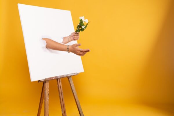 woman in white dress sitting on brown wooden seat